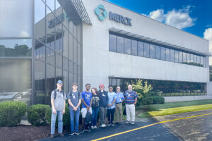 SEED Program: Wilson Community College students posing in front of the Merck building during a tour.
